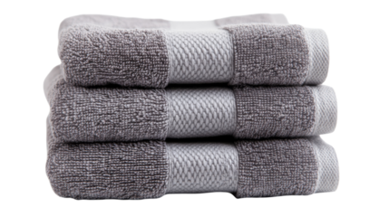 Stack of four grey towels on transparent background
