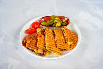 Turkish karisik atom Ayvalik tost ( kasarli bazlama tost) . Sucuklu, Kasarli, kavurmali karisik...