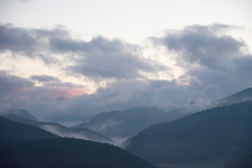 Clouds coming in over the rocky mountains