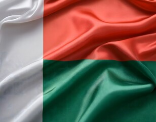 Fototapeta premium Vibrant Madagascar flag waving with luxurious satin texture - Patriotic and cultural symbol