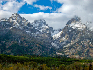 Fototapeta premium Closeup of the Teton Mountain Range with a dusting of snow at Grand Teton National Park.