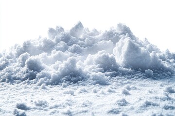 A close-up view of a textured mound of snow against a bright background.