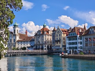 Fototapeta premium Reuss Bridge and Jesuit Church in Lucerne, Switzerland