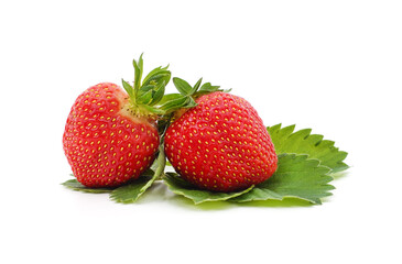 Ripe strawberry with leaves.