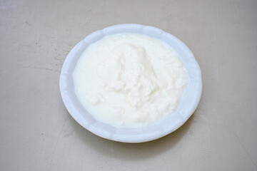 Delicious yogurt scene with Casserole bowl. Closeup shot of healthy fresh yogurt. Karisik kizartma. Top view.
