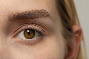 Closeup view of woman with brown eyes