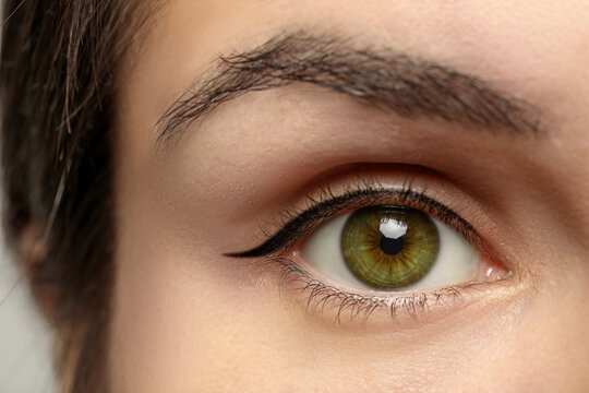 Closeup view of woman with green eyes