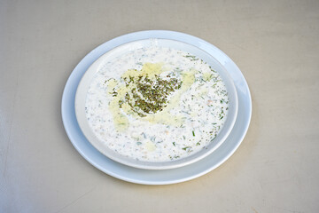 Delicious yogurt scene with Casserole bowl. Closeup shot of healthy fresh yogurt. Karisik kizartma. Top view.