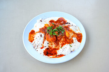 Meat, chicken shawarma kebab with yogurt and fried butter sauce .Tantuni Special. durum  Yogurtlu tantuni. Ekmek arasi tantuni. 