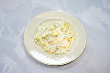 Delicious yogurt scene with Casserole bowl. Closeup shot of healthy fresh yogurt. Karisik kizartma. Top view.