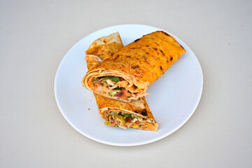 Meat, chicken shawarma kebab with yogurt and fried butter sauce .Tantuni Special. Yogurtlu tantuni.