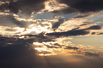 Light coming through the clouds at dawn