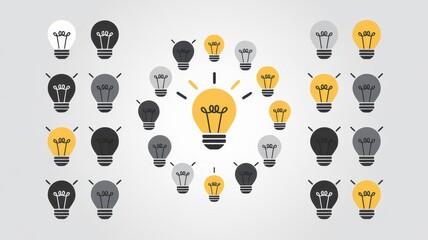 A creative arrangement of light bulbs in various shades of gray and yellow, with a central bright yellow bulb representing a moment of inspiration.