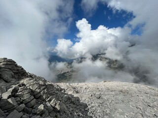 Beautiful photogenic clouds over the Uri Alps massif in the Swiss Alps, Melchtal - Canton of Obwalden, Switzerland (Kanton Obwald, Schweiz)