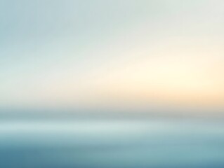 Serene Horizon: A calming abstract image of a blurred horizon, blending soft blue and warm yellow hues, perfect for creating a peaceful and tranquil atmosphere. 