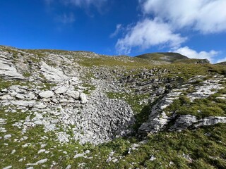 Rocks and stones above Lake Melchsee or Melch Lake and in the Uri Alps mountain massif, Melchtal - Canton of Obwalden, Switzerland (Kanton Obwald, Schweiz)