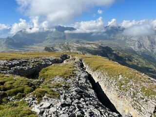 Rocks and stones above Lake Melchsee or Melch Lake and in the Uri Alps mountain massif, Melchtal - Canton of Obwalden, Switzerland (Kanton Obwald, Schweiz)