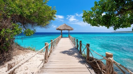 Obraz premium Tropical Beach Pier Under Sunny Sky