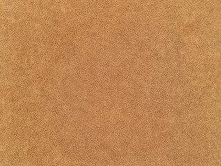 Fototapeta premium Seamless brown texture with minimal coffee inspired pattern, perfect for backgrounds. subtle design creates warm and inviting atmosphere, ideal for various design projects