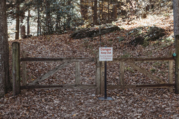 Danger sign in the forest, Danger sign, Hunting season sign, forest, woods, fall forest, keep out sign photo