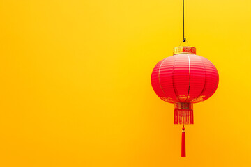 Red Chinese lantern isolated on a yellow background