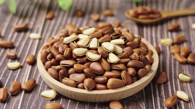 close up of roasted pine nuts background 