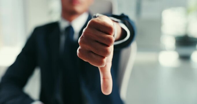 Thumbs down, sign and person with opinion, office and gesture for change of vote, hand or no to deal. Declining, feedback and communication with finger, corporate or rejection for mistake in business