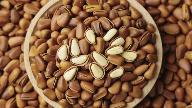 close up of roasted pine nuts background 