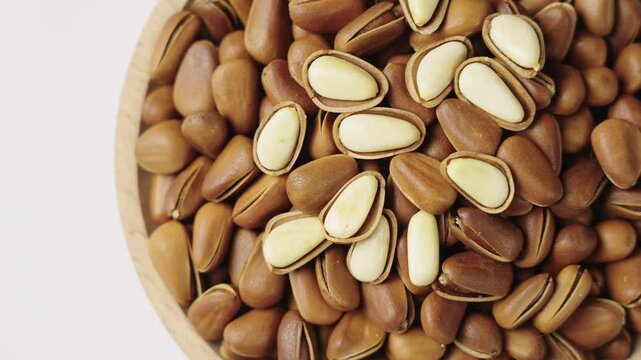 close up of roasted pine nuts background 