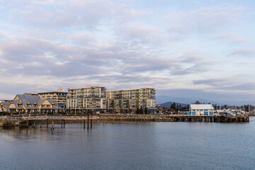 Waterfront Cityscape With Residential Buildings and Scenic Sky