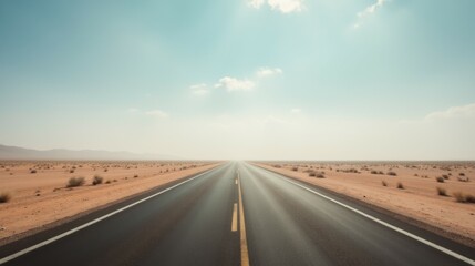 Fototapeta premium Vast Desert Road Under Clear Sky with Distant Horizon View