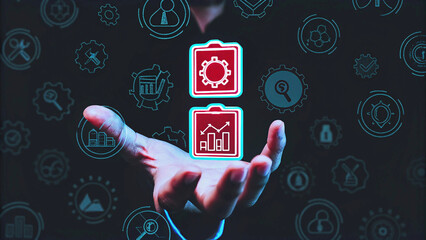 A business professional interacts with a futuristic virtual interface, selecting various icons representing financial growth, technology, and data analysis