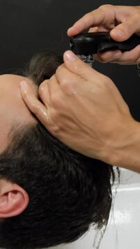 Man getting his hair wash