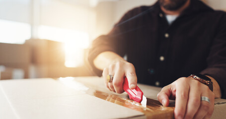 Shipping, box cutter and logistics with hands of person for product return, dropshipping and cargo...