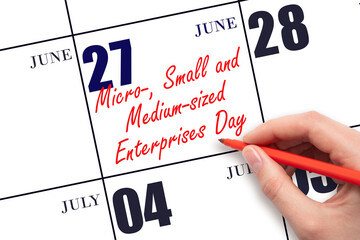 June 27. Hand writing text Micro-, Small and Medium-sized Enterprises Day on calendar date. Save...