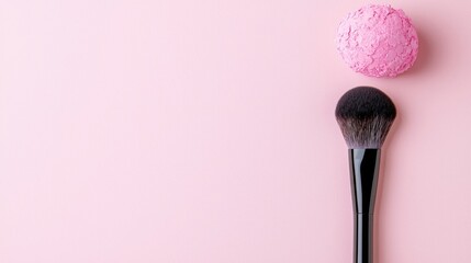 Pink Makeup Brush and Powder Puff on a Background