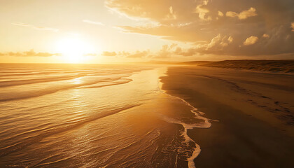 Golden Sunset Over Sandy Beach And Ocean Waves