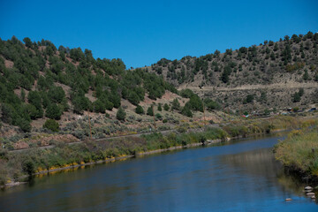 river cutting through rural Colorado