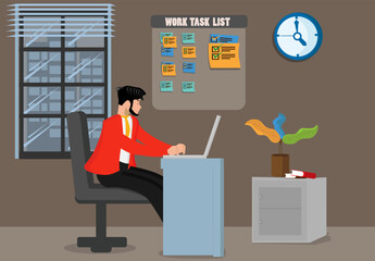 Working from home, a young businessman is sitting in front of his desk at home. A laptop containing work tasks.