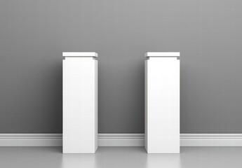 Minimalist White Display Pedestals Against A Grey Wall In A Modern Interior Space
