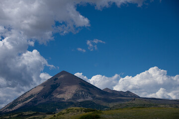 Fototapeta premium Clouds and blue skies over mountains in Southern Colorado