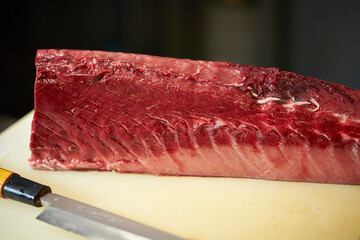 Fresh raw tuna on a cutting board