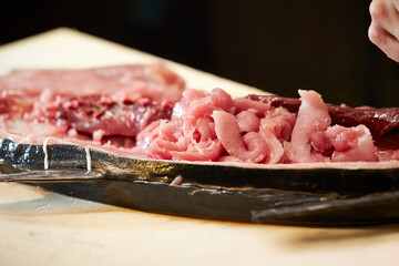 Fresh tuna sashimi on a cutting board