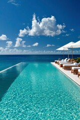 Fototapeta premium Serene infinity pool merges with ocean; lounge chairs nearby; vacation background