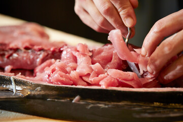 Fresh tuna sashimi on a cutting board