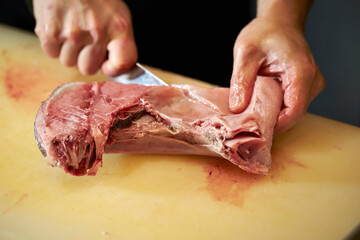 Cut the tuna chunks with a knife	