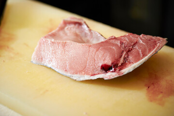 Fresh tuna sashimi on a cutting board