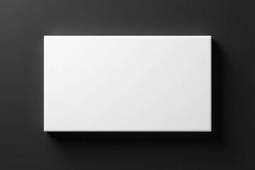 Fototapeta premium Blank White Rectangular Box on Dark Surface Perfect for Product Presentation or Design Mockup