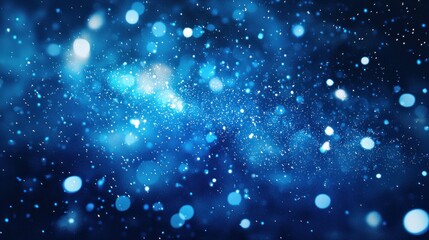 Fireworks in shades of blue bursting in the sky above a city.