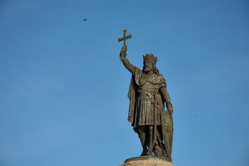 Historic monument of Don Pelayo, first king of Asturias, against a blue sky